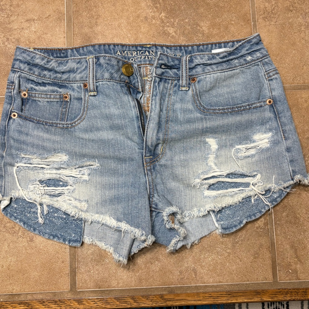 American Eagle Hi-Rise Festival Shorts – Size 6 – Medium Wash Distressed Denim